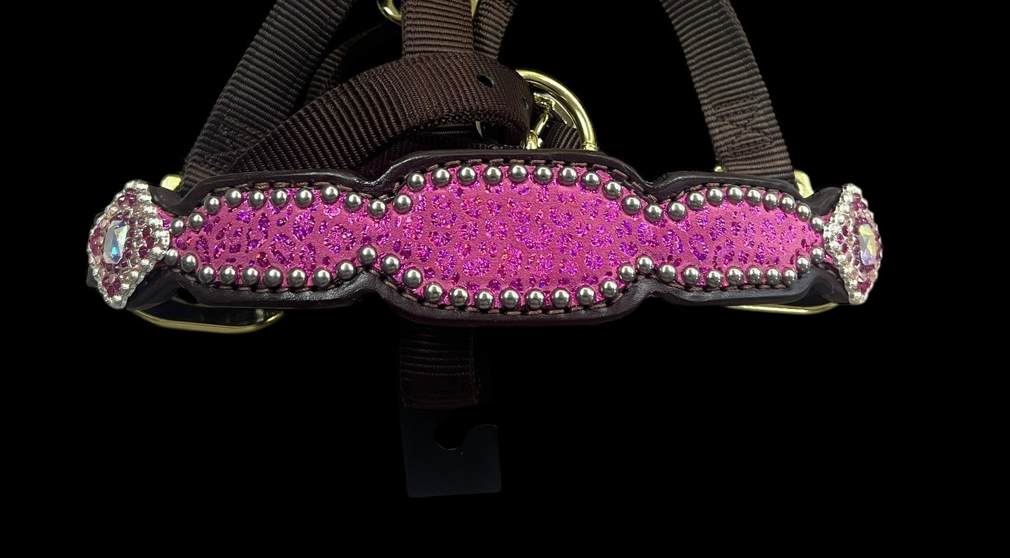 Pink leopard on dark leather