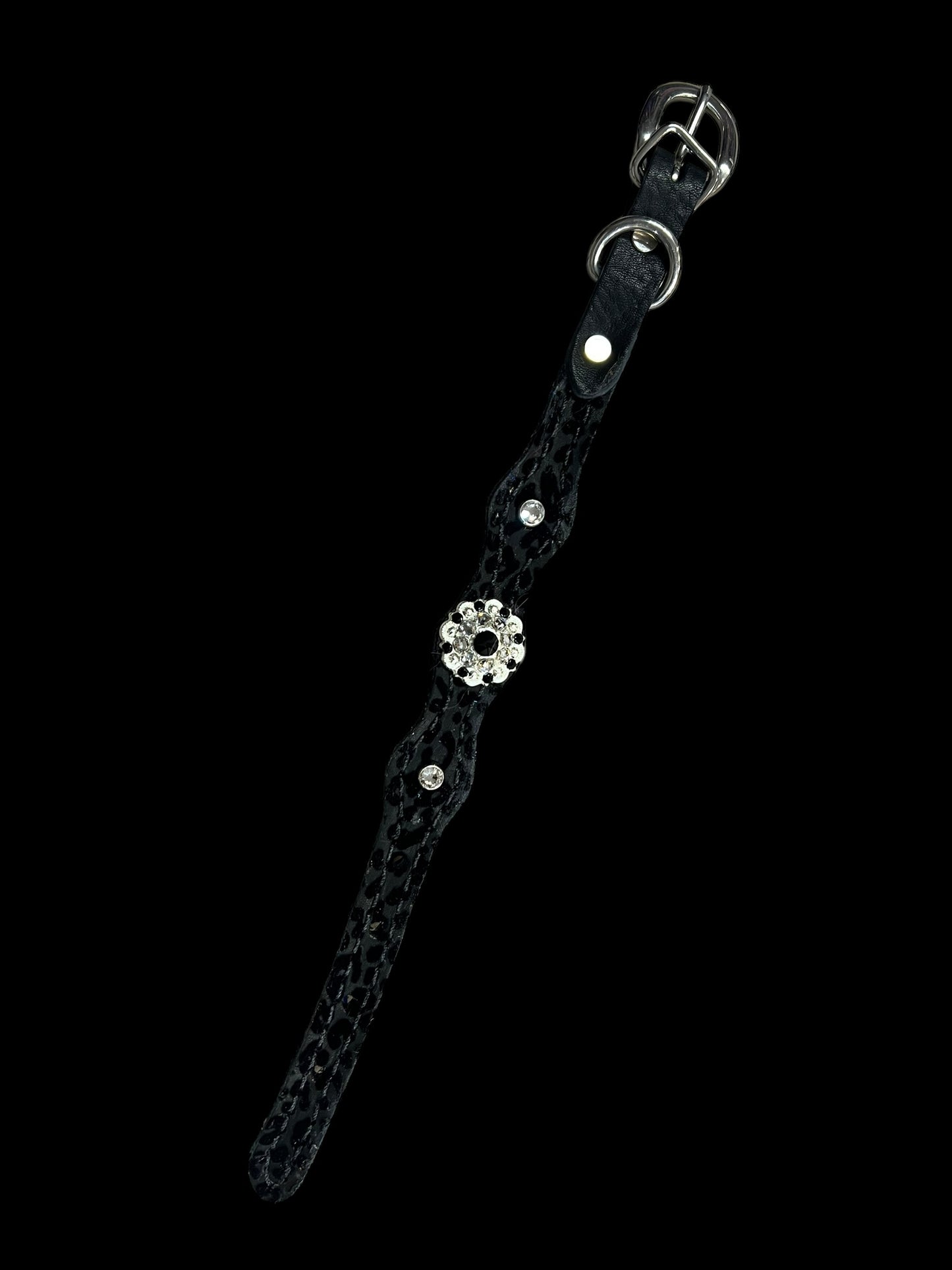 Black flocked leopard on dark leather