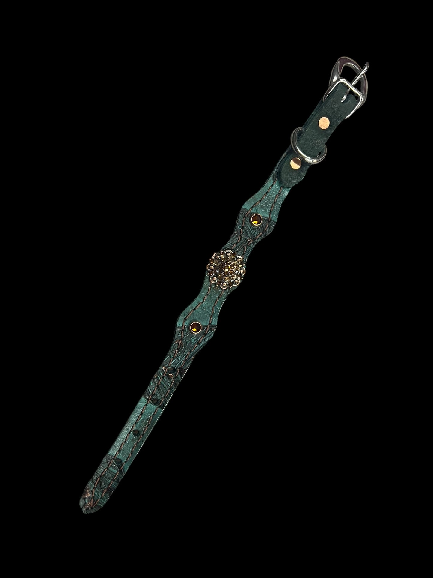 jade feathers on dark leather