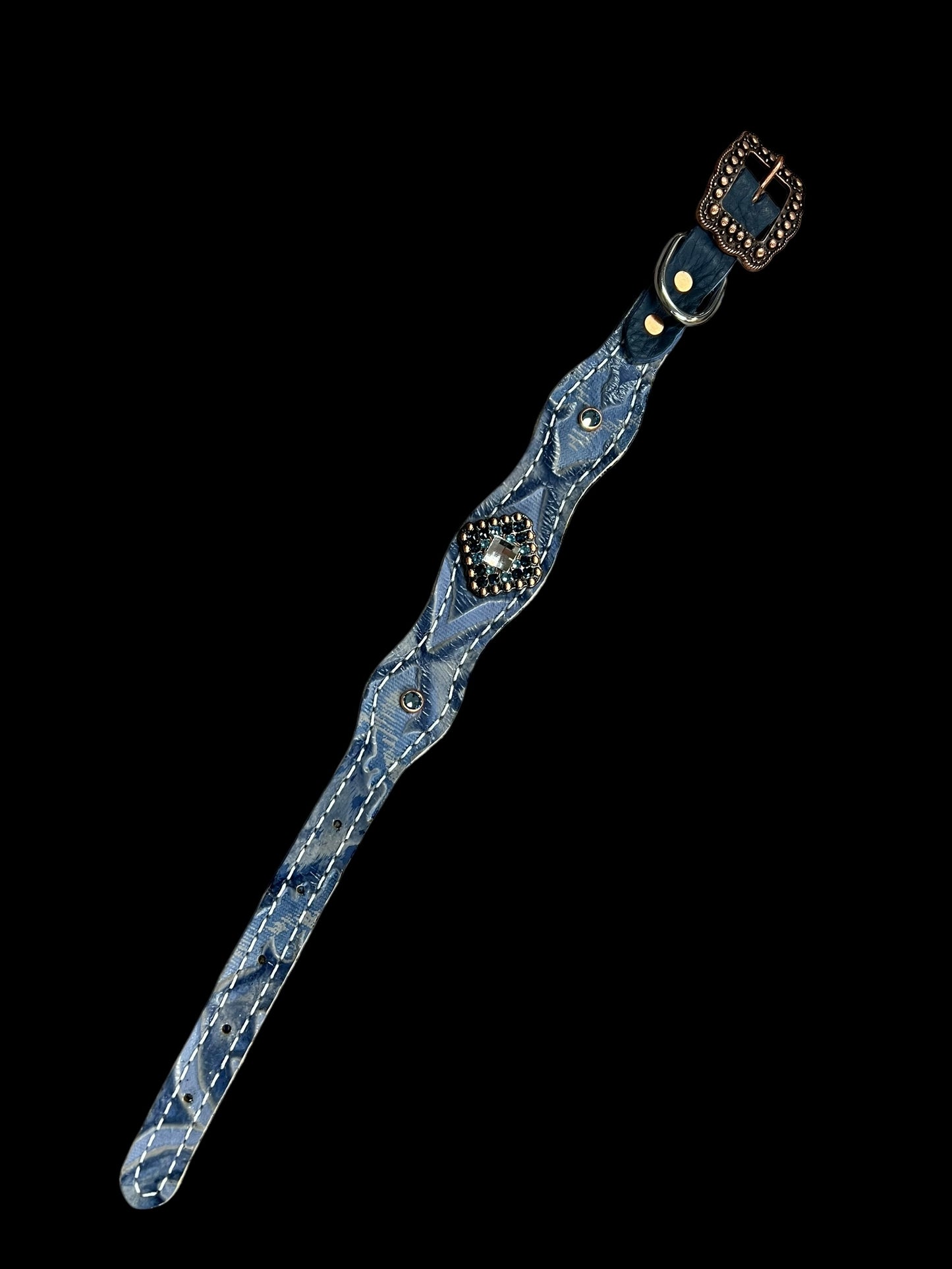 Sapphire sparkle on dark leather