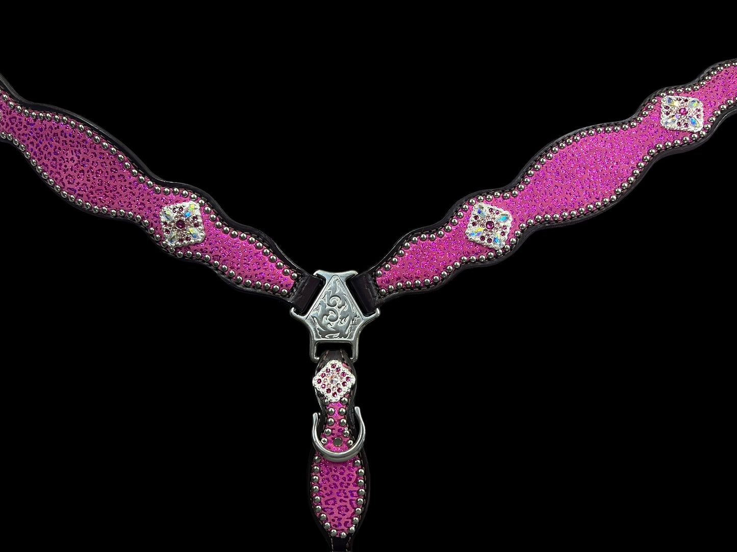 Pink leopard on dark leather