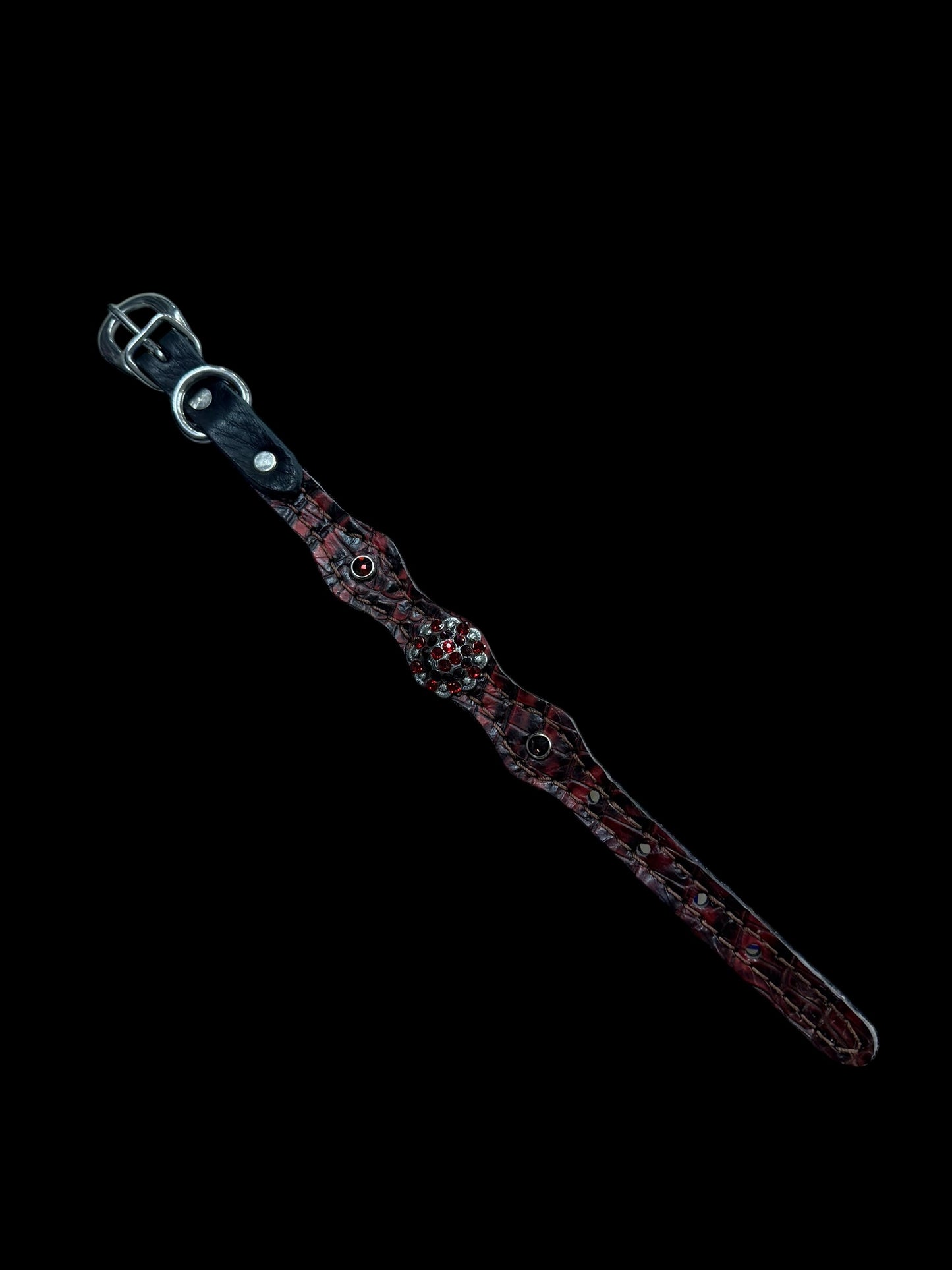 Dark red gator on dark leather
