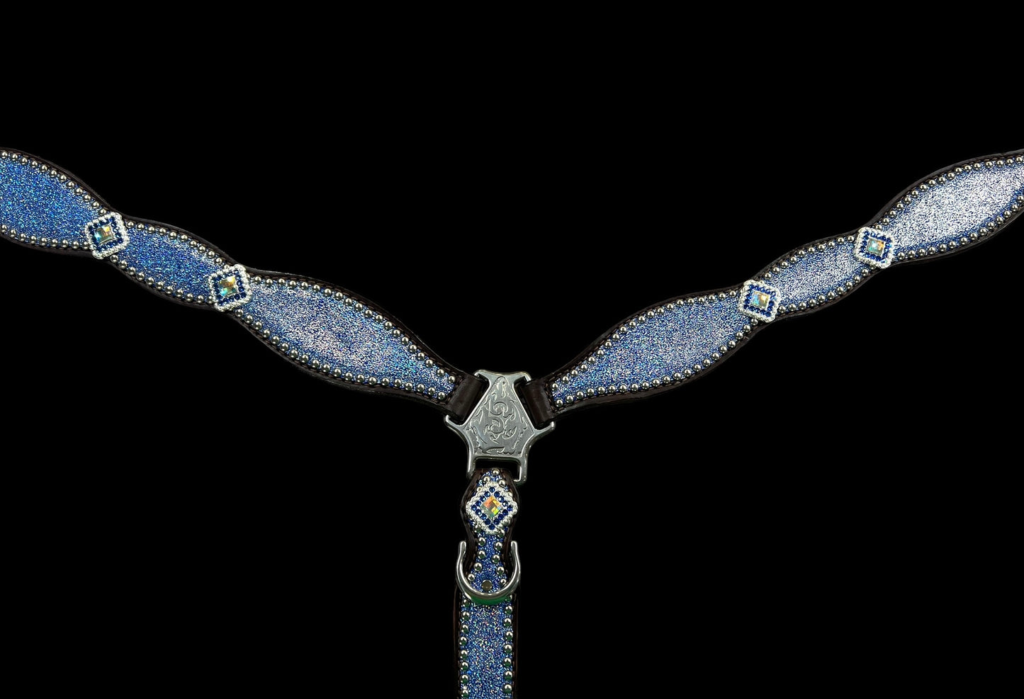 Sapphire sparkle on dark leather