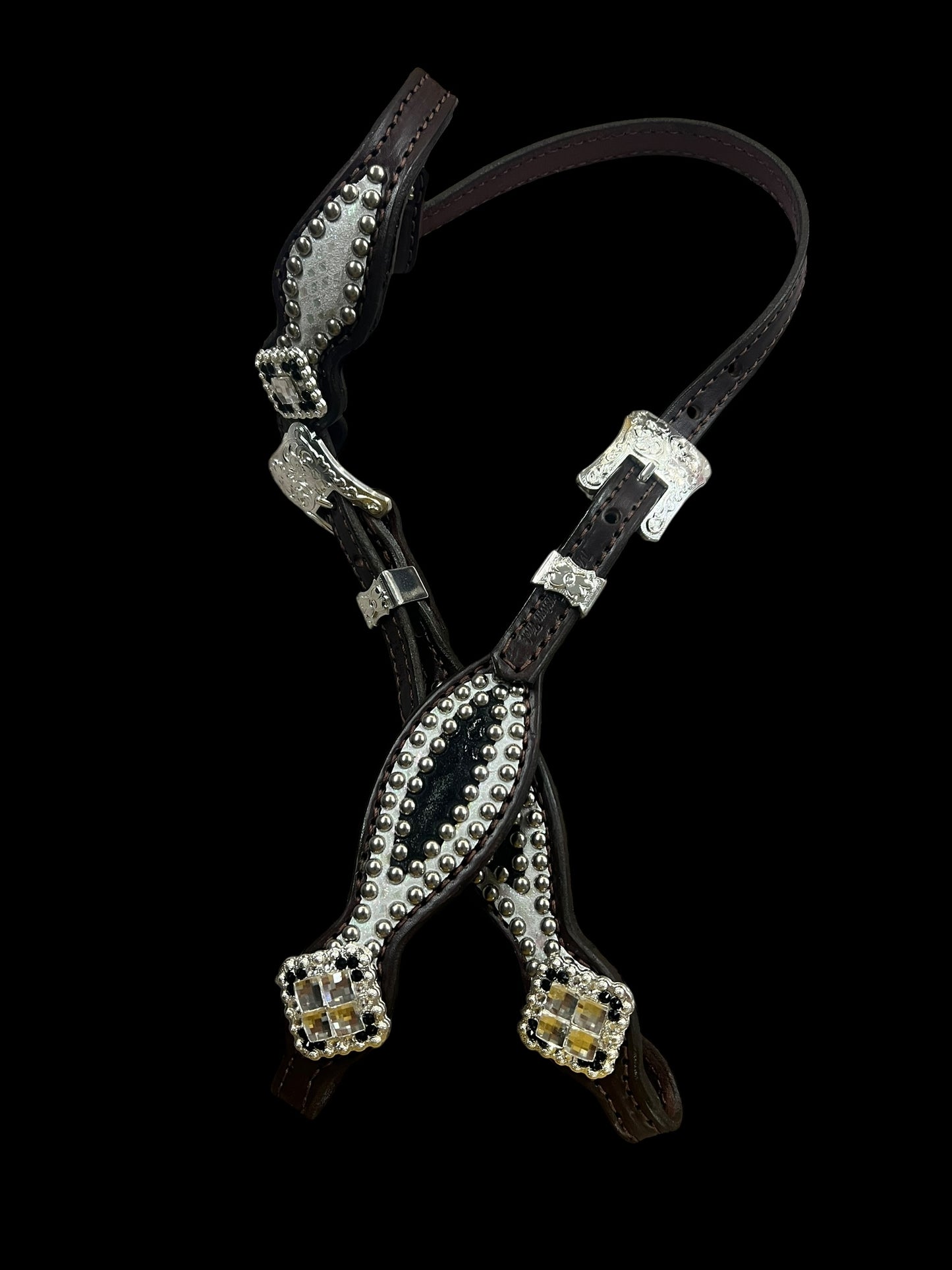 Black and white mystic on dark leather