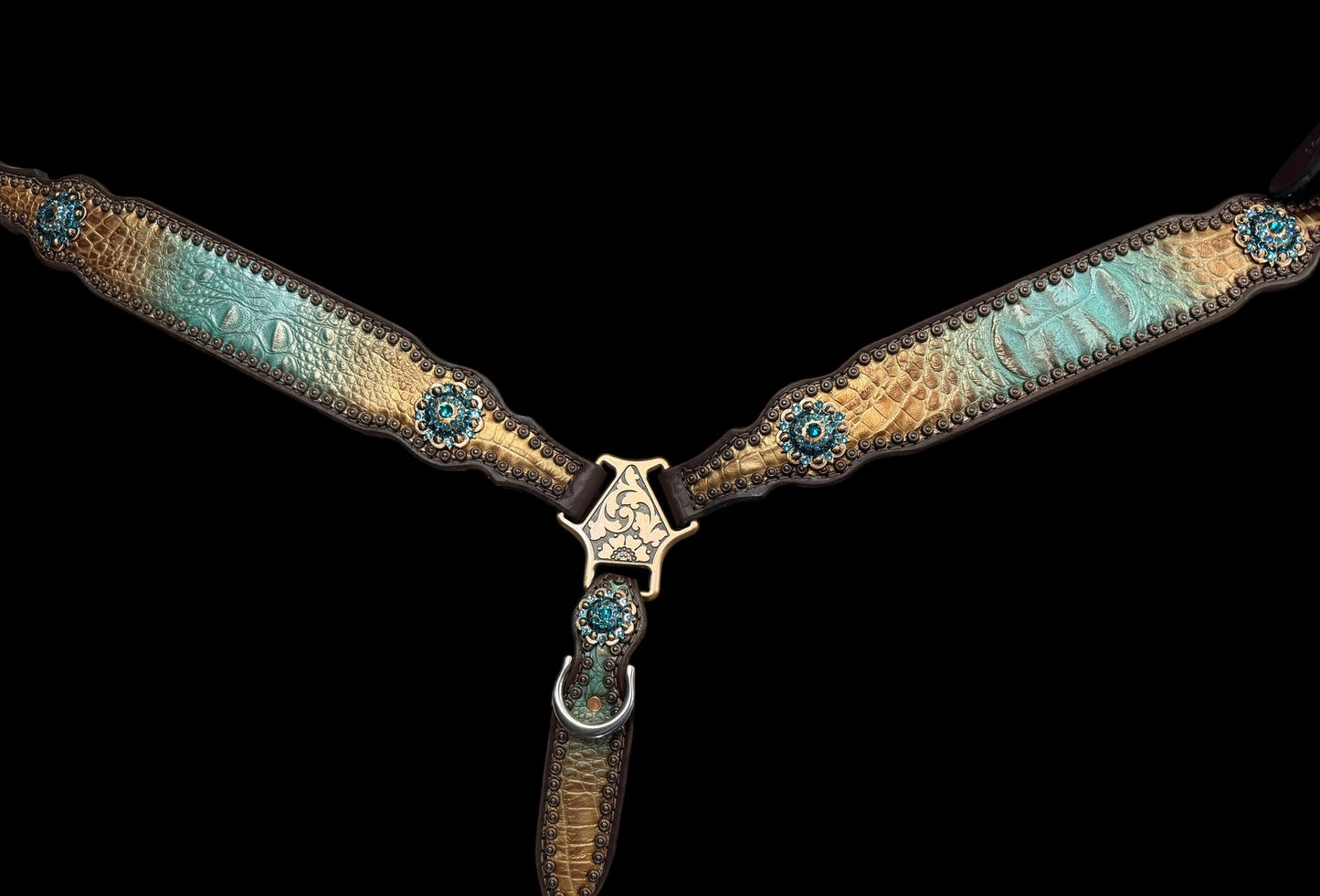 Brown and teal gator on dark leather