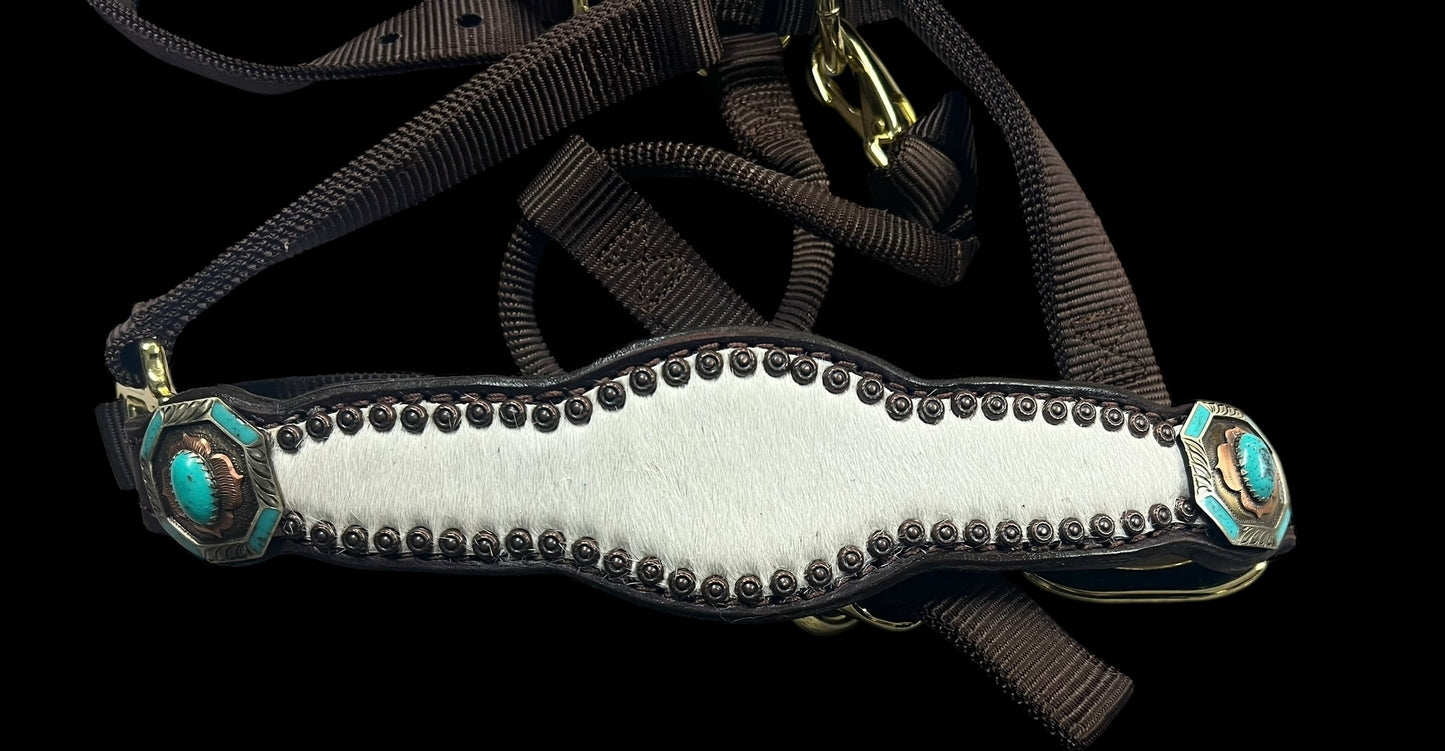 White and grey brindle  cowhide on dark leather