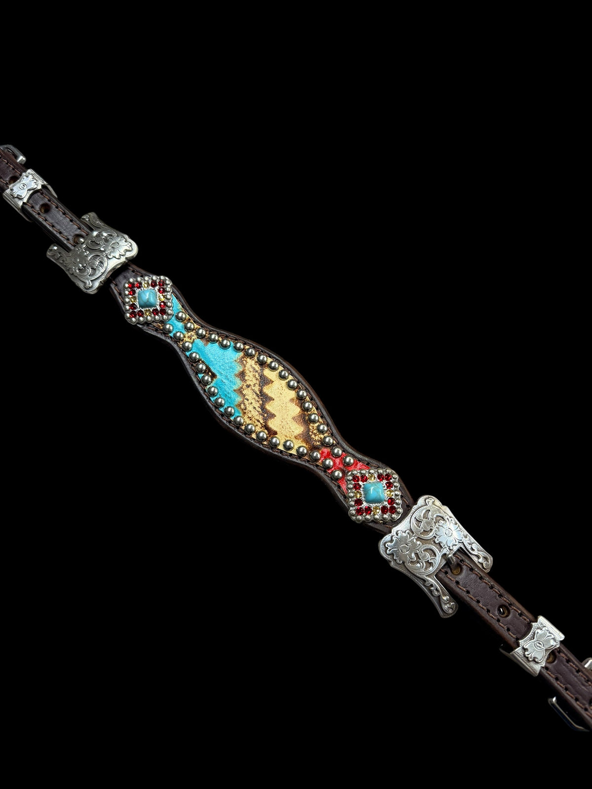 Tan, Red, and Turquoise Taos on dark leather
