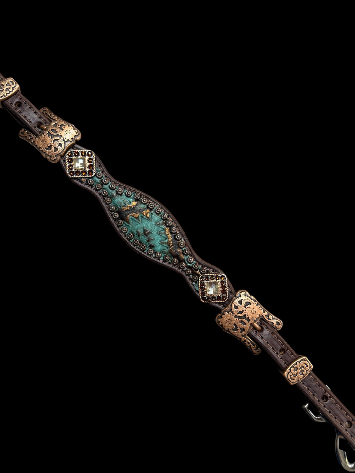 Teal and brown aztec on dark leather
