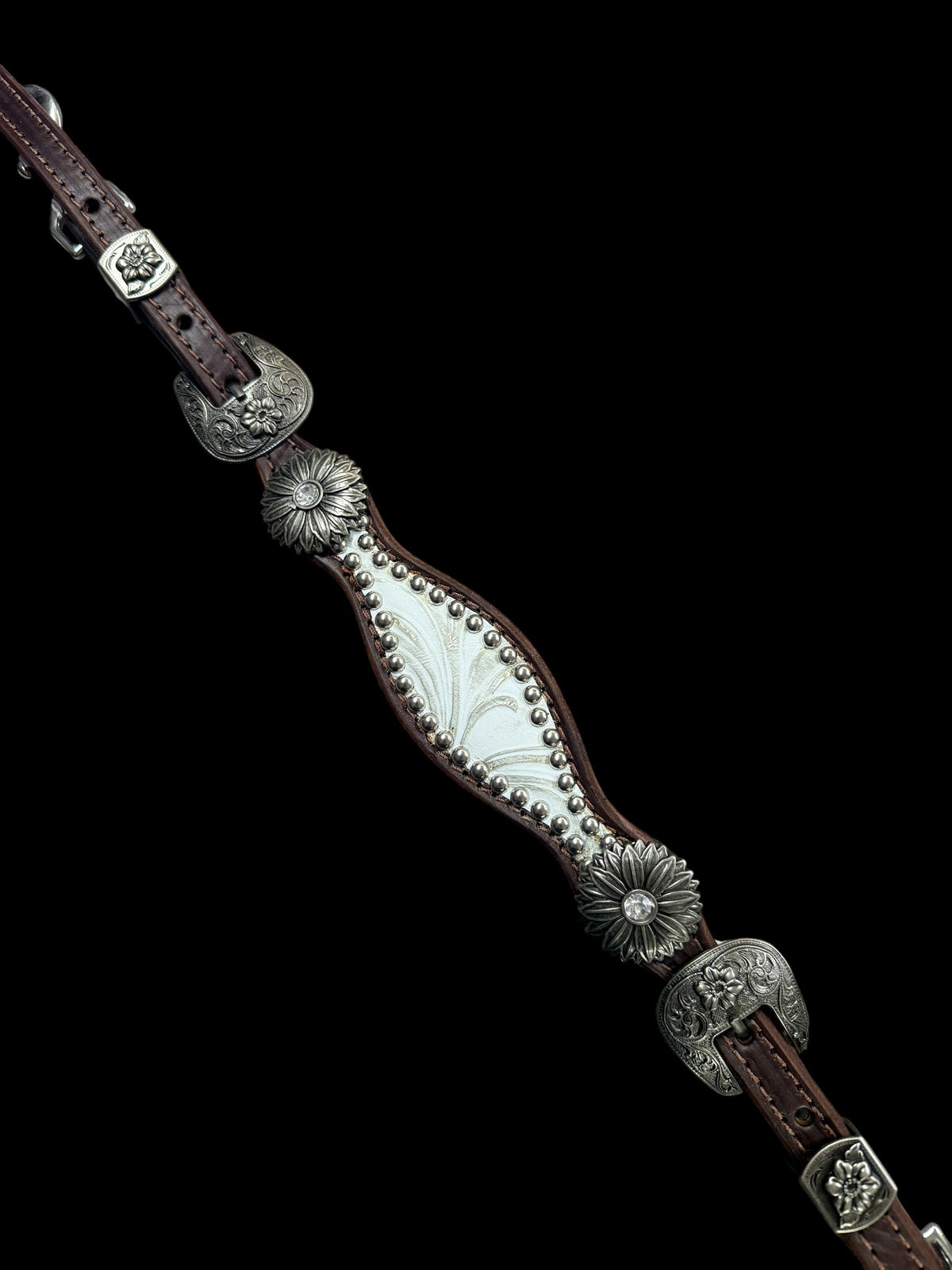 White and silver floral on dark leather