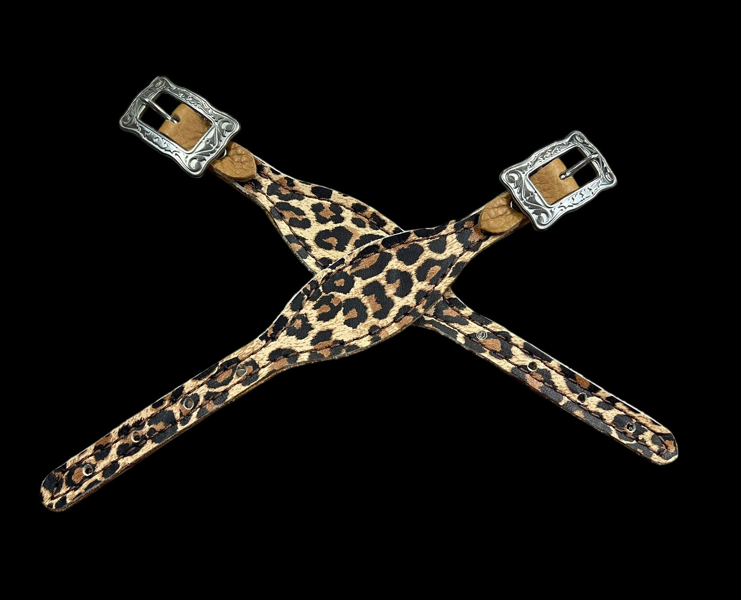 Leopard on dark leather