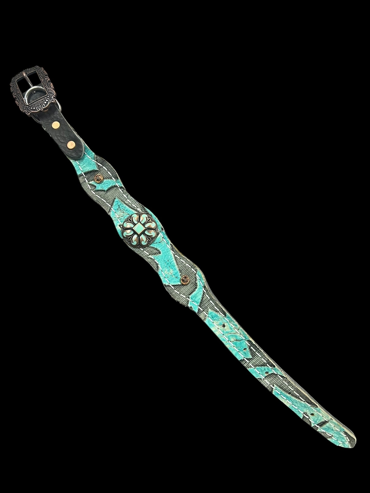 Light turquoise Laredo on dark leather