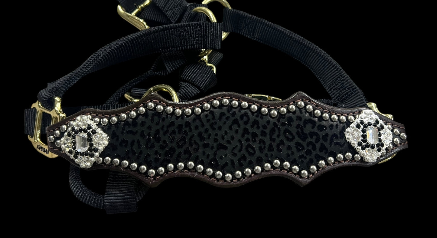 Black flocked leopard on dark leather