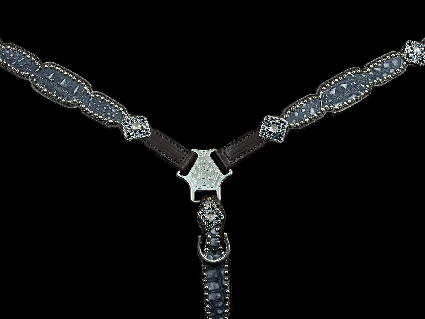 Denim blue gator on dark leather